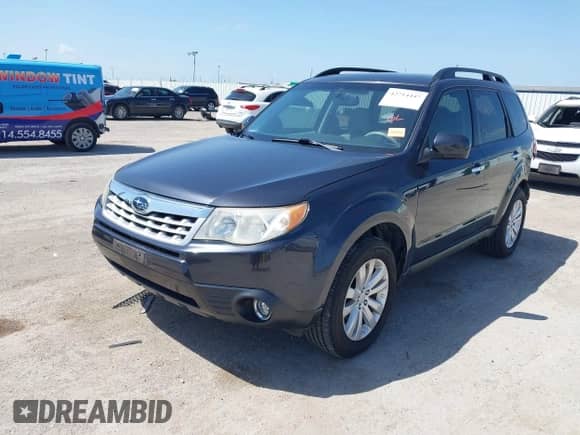 2011 Subaru Forester X Limited with VIN JF2SHBEC4BH757358, listed as a IAAI auction lot 42714447 with 118,001 mi miles and . Bid and sale history available at DreamBid. Image 2.