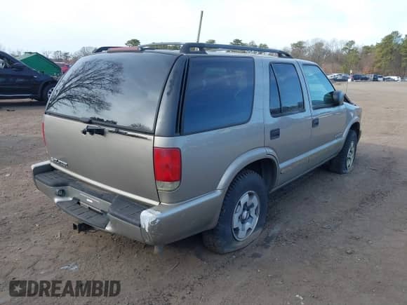 2004 Chevrolet Blazer LS with VIN 1GNDT13X94K103815, listed as a IAAI auction lot 41780349 with 187,296 mi miles and . Bid and sale history available at DreamBid. Image 4.