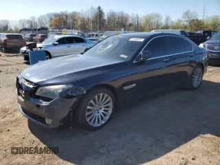 2011 BMW 7 Series 750i xDrive with VIN WBAKC6C59BC394610, listed as a Copart auction lot 52459035 with 171,581 mi miles and Salvage title. Bid and sale history available at DreamBid. Image 1.