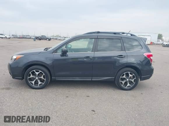 2015 Subaru Forester XT Premium with VIN JF2SJGDC3FH468366, listed as a IAAI auction lot 43140719 with 139,563 mi miles and . Bid and sale history available at DreamBid. Image 14.
