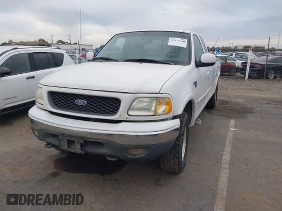 1999 Ford F-150 с VIN 1FTRX18WXXNA24580, выставлен на аукционе IAAI как лот 43430440 с пробегом Не указан миль и . История ставок и продаж доступна на DreamBid. Изображение 2.