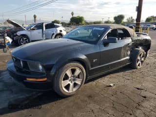 2007 Ford Mustang GT Deluxe с VIN 1ZVHT85H775311474, выставлен на аукционе Copart как лот 69707385 с пробегом 189 603 миль миль и Списание • Salvage title. История ставок и продаж доступна на DreamBid. Изображение 1.