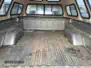 1998 GMC Sierra 1500 z VIN 1GTEC14W0WZ526005, wystawiony jako Copart lot #86539824 z przebiegiem 206 094 mil mil oraz Czysty tytuł • Clean title. Historia ofert i sprzedaży dostępna na DreamBid. Obrazek 10.