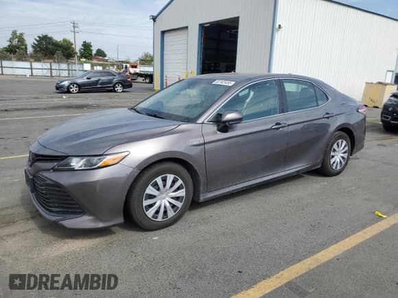 2019 Toyota Camry Hybrid LE с VIN 4T1B31HK3KU006667, выставлен на аукционе Copart как лот 80162455 с пробегом 81 491 миль миль и Списание • Salvage title. История ставок и продаж доступна на DreamBid. Изображение 1.