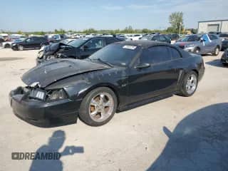 2000 Ford Mustang GT z VIN 1FAFP42X3YF275335, wystawiony jako Copart lot #71953775 z przebiegiem Nie podano mil oraz Szkoda całkowita • Salvage title. Historia ofert i sprzedaży dostępna na DreamBid. Obrazek 1.