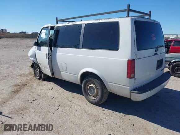 1996 Chevrolet Astro z VIN 1GNDM19W7TB121255, wystawiony jako IAAI lot #41421948 z przebiegiem Nie podano mil oraz . Historia ofert i sprzedaży dostępna na DreamBid. Obrazek 3.