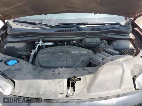 2020 Honda Passport EX-L with VIN 5FNYF8H57LB014709, listed as a Copart auction lot 71562815 with 73,522 mi miles and Salvage title. Bid and sale history available at DreamBid. Image 12.