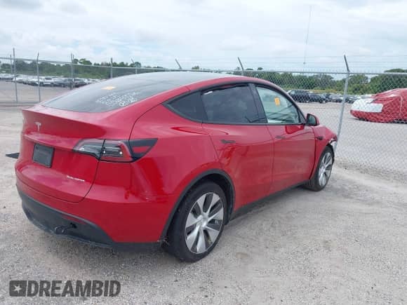 2023 Tesla Model Y Long Range with VIN 7SAYGAEE6PF777290, listed as a IAAI auction lot 43167431 with 19,758 mi miles and . Bid and sale history available at DreamBid. Image 4.