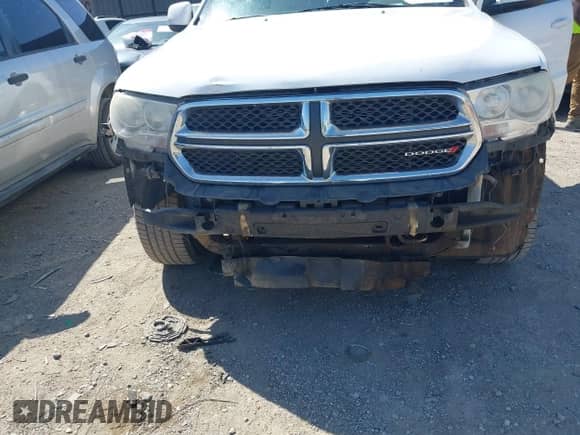 2013 Dodge Durango SXT with VIN 1C4RDHAG1DC678220, listed as a IAAI auction lot 41992038 with 166,725 mi miles and . Bid and sale history available at DreamBid. Image 6.