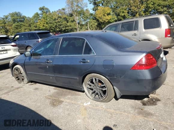 2006 Honda Accord EX-L with VIN 1HGCM65896A022652, listed as a Copart auction lot 74355464 with 198,091 mi miles and Salvage title. Bid and sale history available at DreamBid. Image 2.
