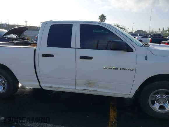 2012 Ram 1500 Tradesman z VIN 1C6RD6FP8CS231893, wystawiony jako IAAI lot #41097504 z przebiegiem 131 717 mil mil oraz . Historia ofert i sprzedaży dostępna na DreamBid. Obrazek 13.