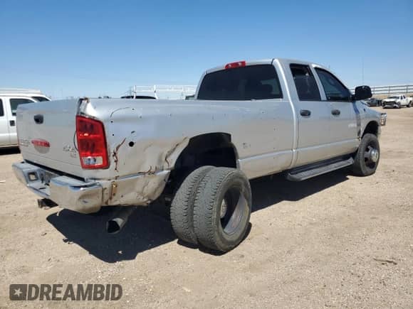 2004 Dodge 3500 SLT with VIN 3D7MU48614G158487, listed as a Copart auction lot 69199324 with 122,891 mi miles and Salvage title. Bid and sale history available at DreamBid. Image 3.