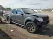 2014 Nissan Frontier SV z VIN 1N6AD0EV1EN765951, wystawiony jako Copart lot #81959215 z przebiegiem 176 818 mil mil oraz Czysty tytuł • Clean title. Historia ofert i sprzedaży dostępna na DreamBid. Obrazek 4.