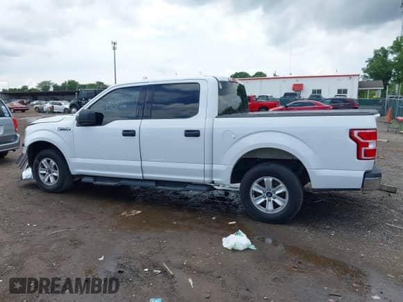 2018 Ford F-150 XL с VIN 1FTEW1CG5JKC57079, выставлен на аукционе IAAI как лот 42524901 с пробегом 127 333 миль миль и . История ставок и продаж доступна на DreamBid. Изображение 14.