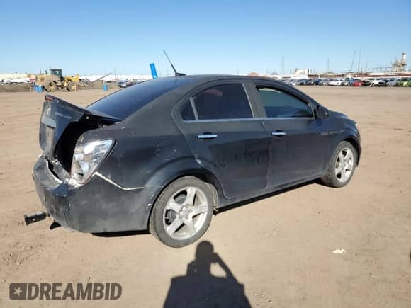 2013 Chevrolet Sonic LTZ с VIN 1G1JE5SH7D4226596, выставлен на аукционе Copart как лот 40272184 с пробегом 150 981 миль миль и Списание • Salvage title. История ставок и продаж доступна на DreamBid. Изображение 3.