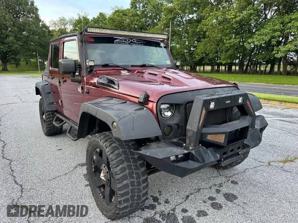 2007 Jeep Wrangler Unlimited X с VIN 1J8GA39147L156911, выставлен на аукционе Copart как лот 60941945 с пробегом 115 766 миль миль и Чистый • Clean title. История ставок и продаж доступна на DreamBid. Изображение 1.