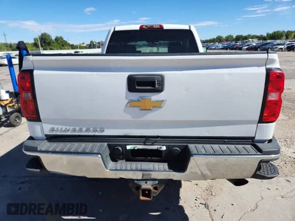 2018 Chevrolet Silverado 2500HD Work Truck with VIN 1GC2KUEG6JZ184230, listed as a Copart auction lot 80214565 with 97,858 mi miles and Salvage title. Bid and sale history available at DreamBid. Image 6.