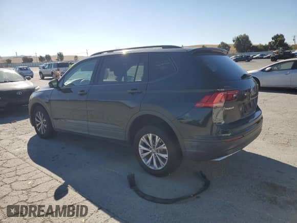 2018 Volkswagen Tiguan S с VIN 3VV1B7AX7JM108666, выставлен на аукционе Copart как лот 80034905 с пробегом 109 757 миль миль и Списание • Salvage title. История ставок и продаж доступна на DreamBid. Изображение 2.