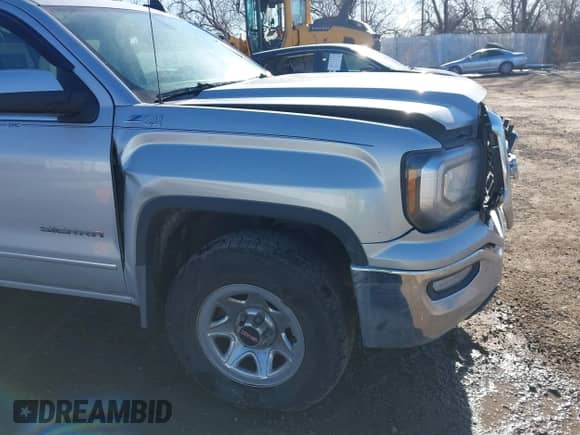 2017 GMC Sierra 1500 SLE with VIN 1GTV2MEC5HZ404851, listed as a IAAI auction lot 41733001 with 119,184 mi miles and . Bid and sale history available at DreamBid. Image 19.