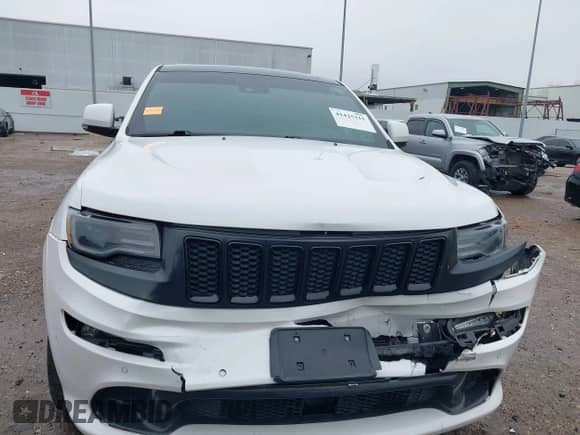 2016 Jeep Grand Cherokee SRT with VIN 1C4RJFDJ0GC456325, listed as a IAAI auction lot 41425211 with 159,746 mi miles and . Bid and sale history available at DreamBid. Image 12.