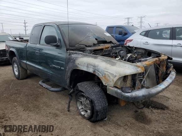 1998 Dodge Dakota SLT z VIN 1B7GG22Y0WS663798, wystawiony jako Copart lot #44569915 z przebiegiem Nie podano mil oraz Szkoda całkowita • Salvage title. Historia ofert i sprzedaży dostępna na DreamBid. Obrazek 4.