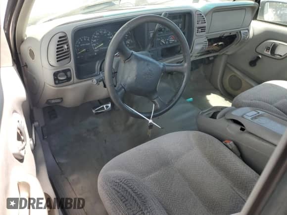 1998 GMC Sierra 1500 z VIN 1GTEC14MXWZ850349, wystawiony jako Copart lot #65374255 z przebiegiem 102 157 mil mil oraz Szkoda całkowita • Salvage title. Historia ofert i sprzedaży dostępna na DreamBid. Obrazek 8.