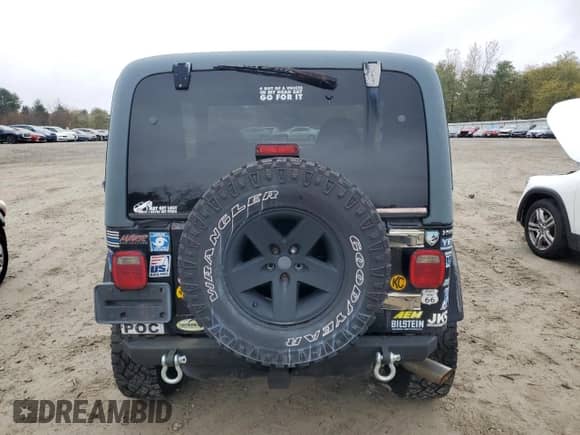 2001 Jeep Wrangler Sport z VIN 1J4FA49SX1P347129, wystawiony jako Copart lot #90684705 z przebiegiem 139 975 mil mil oraz Czysty tytuł • Clean title. Historia ofert i sprzedaży dostępna na DreamBid. Obrazek 6.