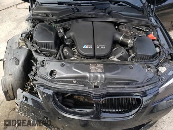 2008 BMW 5 Series M5 с VIN WBSNB93548CX09643, выставлен на аукционе Copart как лот 83785065 с пробегом Не указан миль и На запчасти • Non repairable. История ставок и продаж доступна на DreamBid. Изображение 11.