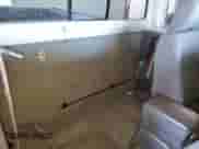 2003 Nissan Frontier XE z VIN 1N6ED26Y43C421206, wystawiony jako Copart lot #42264105 z przebiegiem 117 879 mil mil oraz Szkoda całkowita • Salvage title. Historia ofert i sprzedaży dostępna na DreamBid. Obrazek 10.