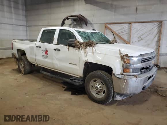 2015 Chevrolet Silverado 2500HD Work Truck z VIN 1GC1KUEG5FF652954, wystawiony jako Copart lot #56283235 z przebiegiem 235 014 mil mil oraz Szkoda całkowita • Salvage title. Historia ofert i sprzedaży dostępna na DreamBid. Obrazek 4.