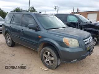2006 Honda Pilot EX-L with VIN 5FNYF18506B015437, listed as a IAAI auction lot 43427931 with 305,332 mi miles and . Bid and sale history available at DreamBid. Image 1.