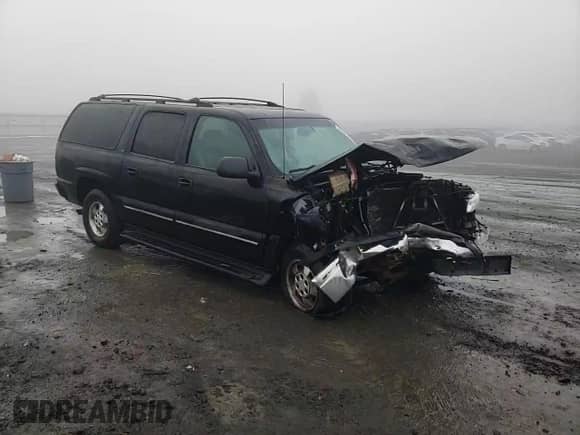 2001 Chevrolet Suburban LT z VIN 1GNFK16T51J291545, wystawiony jako Copart lot #39987254 z przebiegiem Nie podano mil oraz Szkoda całkowita • Salvage title. Historia ofert i sprzedaży dostępna na DreamBid. Obrazek 11.