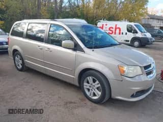 2012 Dodge Grand Caravan Crew with VIN 2C4RDGDG0CR359757, listed as a IAAI auction lot 43485394 with 84,105 mi miles and . Bid and sale history available at DreamBid. Image 1.