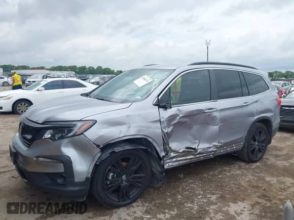 2021 Honda Pilot Special Edition z VIN 5FNYF5H29MB004351, wystawiony jako IAAI lot #42484374 z przebiegiem 52 855 mil mil oraz . Historia ofert i sprzedaży dostępna na DreamBid. Obrazek 6.