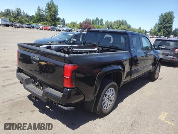 2024 Toyota Tacoma TRD Off Road with VIN 3TMLB5JN1RM085942, listed as a Copart auction lot 64483585 with 1,975 mi miles and Salvage title. Bid and sale history available at DreamBid. Image 3.