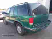 1999 Chevrolet Blazer LT z VIN 1GNDT13W5X2131249, wystawiony jako IAAI lot #42306564 z przebiegiem 162 149 mil mil oraz . Historia ofert i sprzedaży dostępna na DreamBid. Obrazek 3.