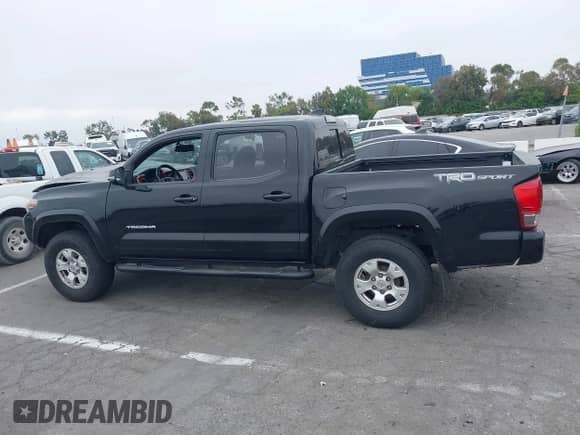 2017 Toyota Tacoma SR5 with VIN 3TMAZ5CN4HM047698, listed as a IAAI auction lot 42465382 with 132,297 mi miles and . Bid and sale history available at DreamBid. Image 15.