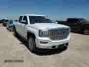 2016 GMC Sierra 1500 Denali z VIN 3GTU2PEJ1GG371793, wystawiony jako Copart lot #67460875 z przebiegiem 231 730 mil mil oraz Czysty tytuł • Clean title. Historia ofert i sprzedaży dostępna na DreamBid. Obrazek 13.