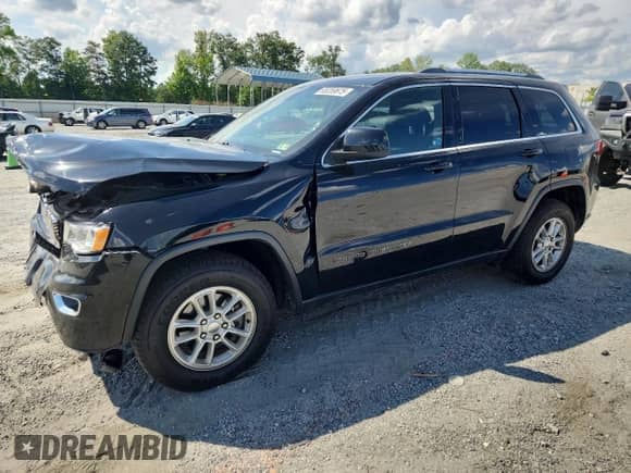 2020 Jeep Grand Cherokee Laredo E with VIN 1C4RJEAG5LC282734, listed as a Copart auction lot 65259675 with 109,022 mi miles and Salvage title. Bid and sale history available at DreamBid. Image 1.