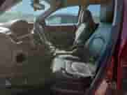 2016 Chevrolet Traverse LTZ z VIN 1GNKVJKD9GJ213704, wystawiony jako Copart lot #84606845 z przebiegiem 142 163 mil mil oraz Szkoda całkowita • Salvage title. Historia ofert i sprzedaży dostępna na DreamBid. Obrazek 7.