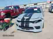 2022 Dodge Charger Scat Pack z VIN 2C3CDXGJ2NH104344, wystawiony jako IAAI lot #43124603 z przebiegiem 53 596 mil mil oraz . Historia ofert i sprzedaży dostępna na DreamBid. Obrazek 6.