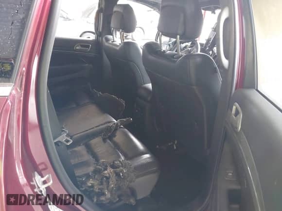 2018 Jeep Grand Cherokee Sterling with VIN 1C4RJEBG9JC274891, listed as a IAAI auction lot 43016082 with 103,987 mi miles and . Bid and sale history available at DreamBid. Image 8.