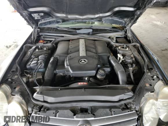 2005 Mercedes-Benz SL 500 с VIN WDBSK75F55F102695, выставлен на аукционе Copart как лот 70047815 с пробегом 194 655 миль миль и Списание • Salvage title. История ставок и продаж доступна на DreamBid. Изображение 11.