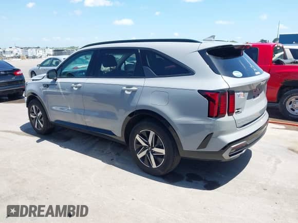 2023 Kia Sorento EX with VIN 5XYRH4LF5PG228054, listed as a IAAI auction lot 42641510 with 16,596 mi miles and . Bid and sale history available at DreamBid. Image 3.