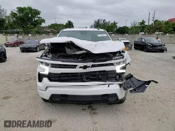2023 Chevrolet Silverado 1500 z VIN 1GCPADE86PZ321242, wystawiony jako Copart lot #77026824 z przebiegiem 7 400 mil mil oraz Szkoda całkowita • Salvage title. Historia ofert i sprzedaży dostępna na DreamBid. Obrazek 13.