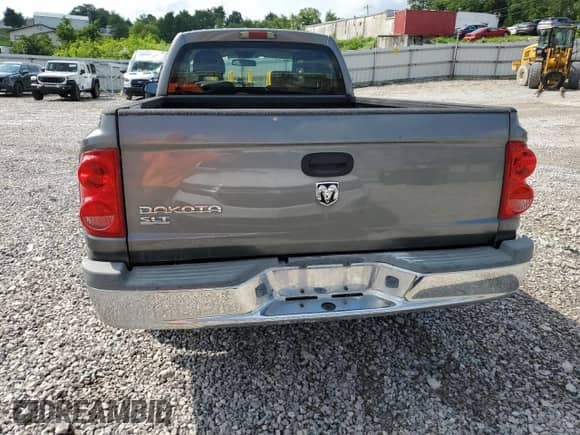 2006 Dodge Dakota SLT с VIN 1D7HE42K66S519339, выставлен на аукционе Copart как лот 65167425 с пробегом 141 132 миль миль и Списание • Salvage title. История ставок и продаж доступна на DreamBid. Изображение 6.