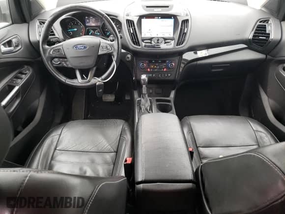 2017 Ford Escape Titanium с VIN 1FMCU0JD9HUD04723, выставлен на аукционе Copart как лот 87801365 с пробегом 126 452 миль миль и Списание • Salvage title. История ставок и продаж доступна на DreamBid. Изображение 8.
