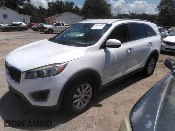 2017 Kia Sorento LX with VIN 5XYPG4A56HG285594, listed as a IAAI auction lot 42763918 with 168,573 mi miles and . Bid and sale history available at DreamBid. Image 2.