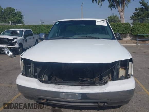 2000 GMC Sierra 1500 SLE z VIN 1GTEC19T0YZ300810, wystawiony jako IAAI lot #42471227 z przebiegiem Nie podano mil oraz . Historia ofert i sprzedaży dostępna na DreamBid. Obrazek 12.