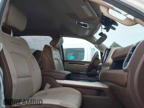 2021 Ram 1500 Laramie z VIN 1C6SRFJMXMN705990, wystawiony jako IAAI lot #41155618 z przebiegiem 89 518 mil mil oraz . Historia ofert i sprzedaży dostępna na DreamBid. Obrazek 5.